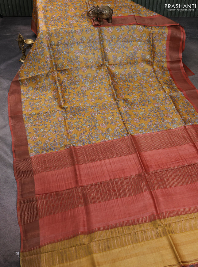 Pure tussar silk saree mustard yellow and orange with allover floral prints and zari woven border