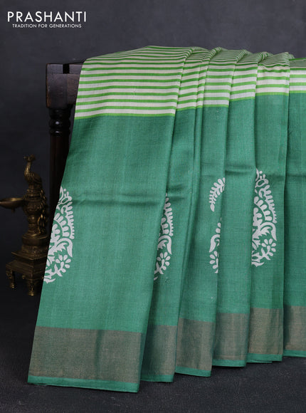 Pure tussar silk saree off white light green and green with allover stripe prints and zari woven border