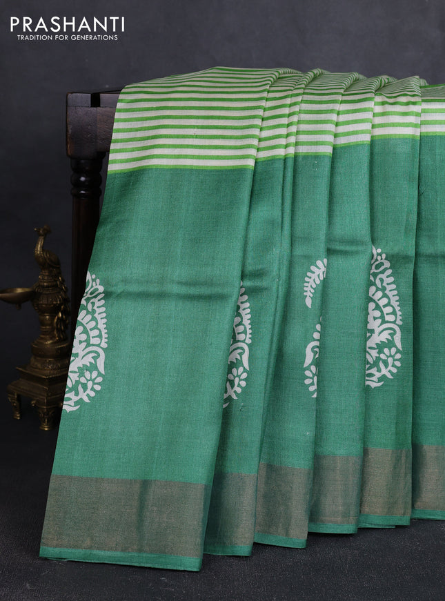 Pure tussar silk saree off white light green and green with allover stripe prints and zari woven border