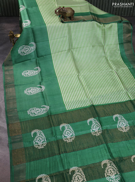 Pure tussar silk saree off white light green and green with allover stripe prints and zari woven border