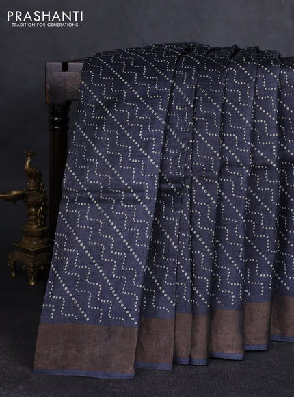 Pure tussar silk saree dark grey with allover prints and zari woven border