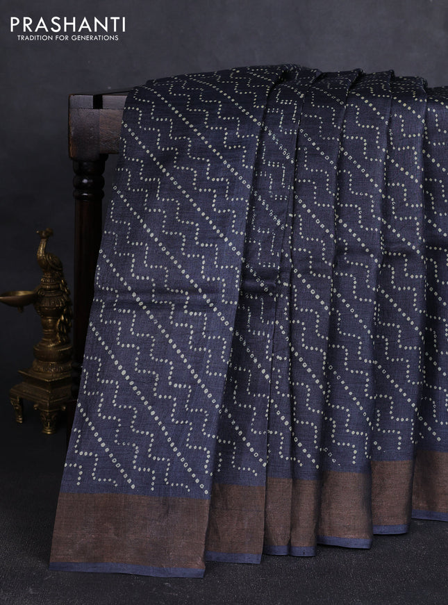 Pure tussar silk saree dark grey with allover prints and zari woven border