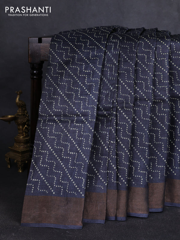Pure tussar silk saree dark grey with allover prints and zari woven border