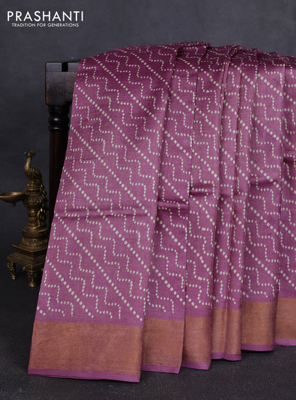 Pure tussar silk saree mauve pink with allover prints and zari woven border