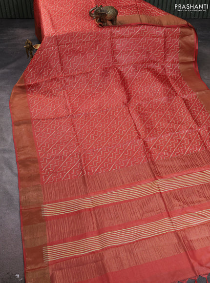 Pure tussar silk saree rust shade with allover prints and zari woven border