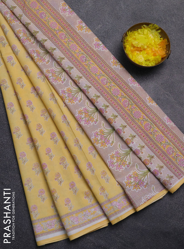 Mul cotton saree yellow with allover butta prints and printed border