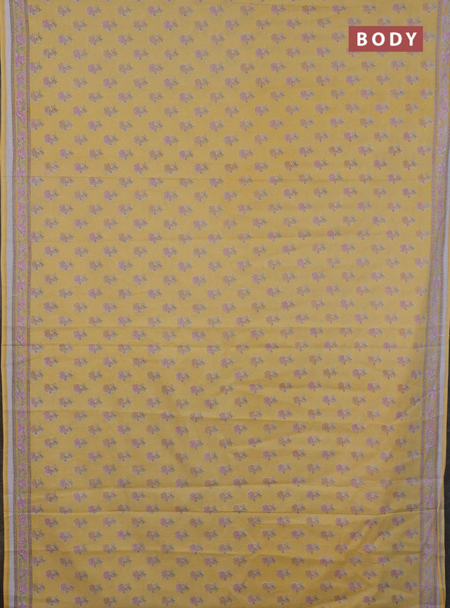 Mul cotton saree yellow with allover butta prints and printed border