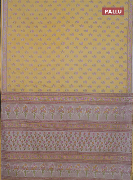 Mul cotton saree yellow with allover butta prints and printed border