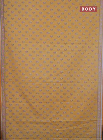 Mul cotton saree off white and mango yellow with allover butta prints and printed border