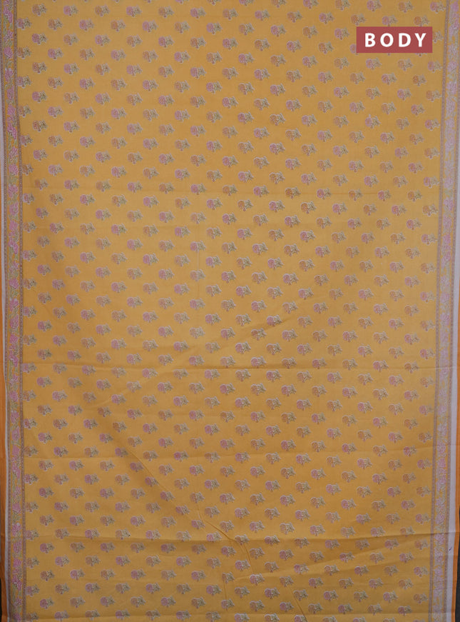 Mul cotton saree off white and mango yellow with allover butta prints and printed border