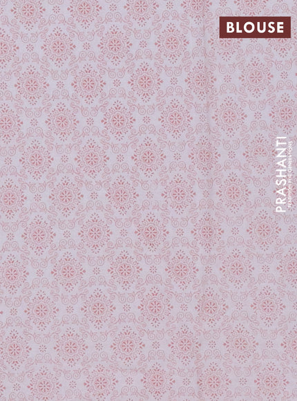 Mul cotton saree off white and peach shade with allover prints and printed border
