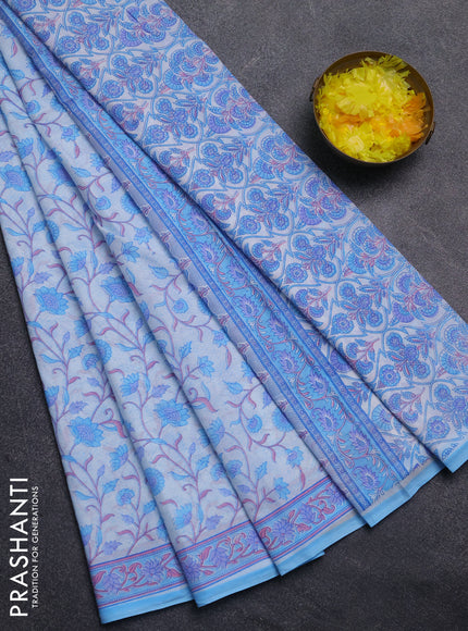 Mul cotton saree off white and light blue with allover floral prints and printed border