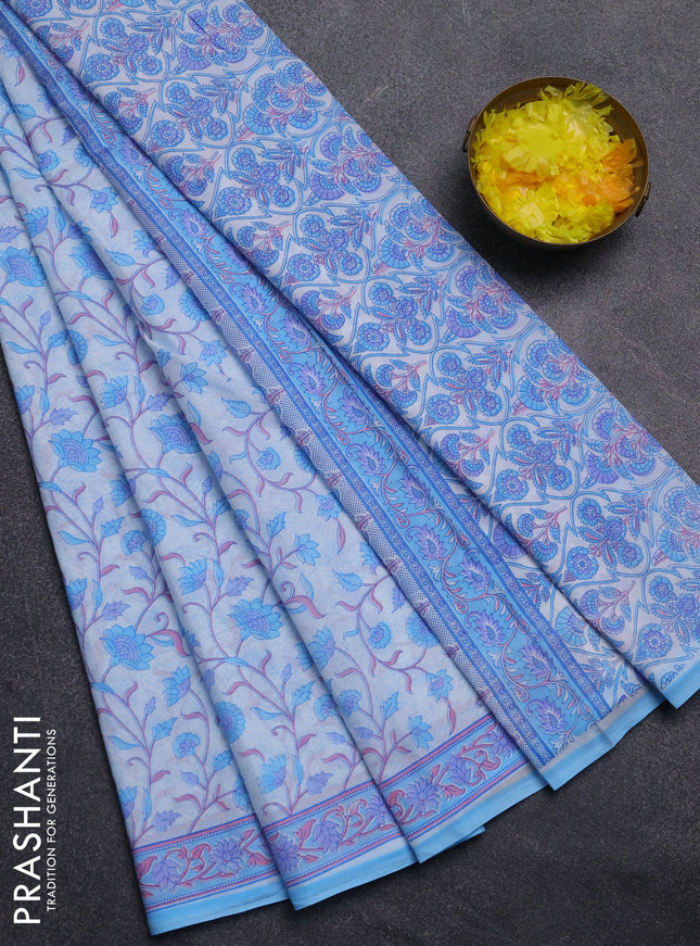 Mul cotton saree off white and light blue with allover floral prints and printed border