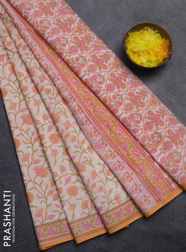 Mul cotton saree cream and orange with allover floral prints and printed border