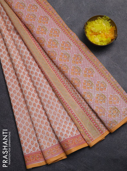 Mul cotton saree cream and orange with allover butta prints and printed border