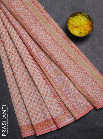 Mul cotton saree cream and peach shade with allover butta prints and printed border