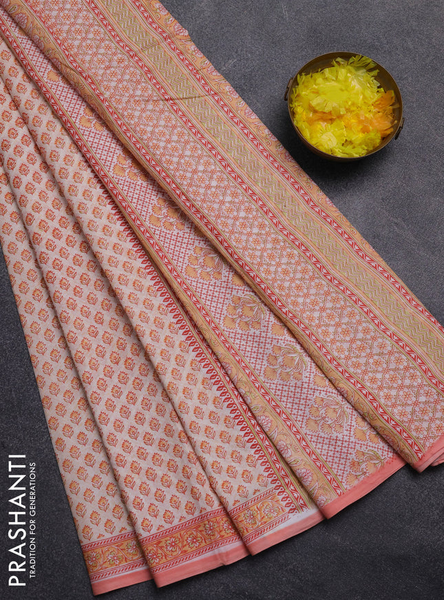 Mul cotton saree cream and peach shade with allover butta prints and printed border
