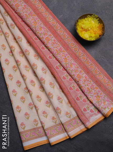 Mul cotton saree cream and orange with allover floral butta prints and printed border