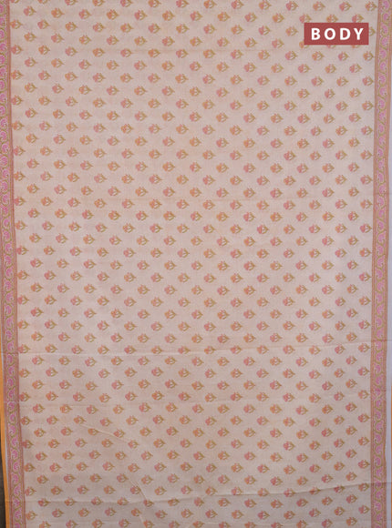 Mul cotton saree cream and orange with allover floral butta prints and printed border