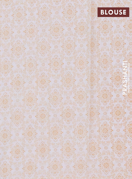 Mul cotton saree cream and orange with allover floral butta prints and printed border
