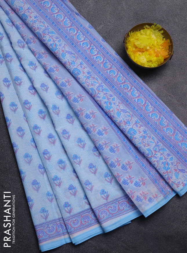 Mul cotton saree off white and light blue with allover floral butta prints and printed border