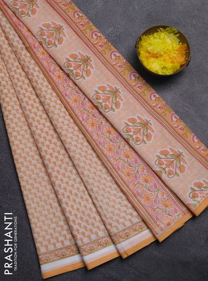 Mul cotton saree cream and orange with allover butta prints and printed border