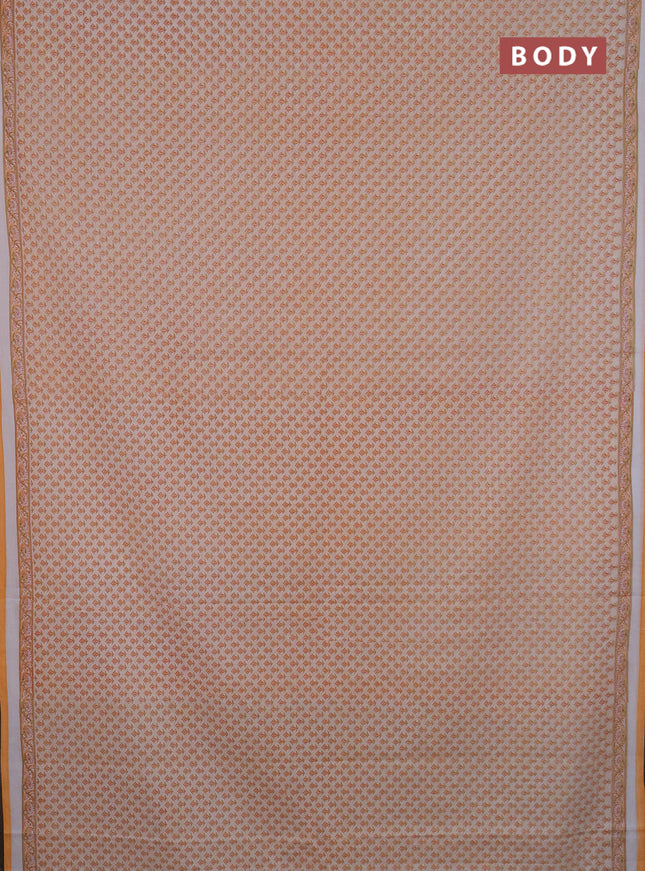Mul cotton saree cream and orange with allover butta prints and printed border