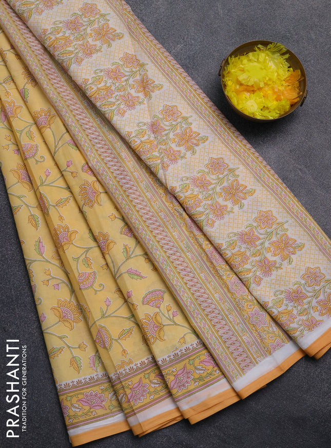 Mul cotton saree yellow with allover floral prints and printed border