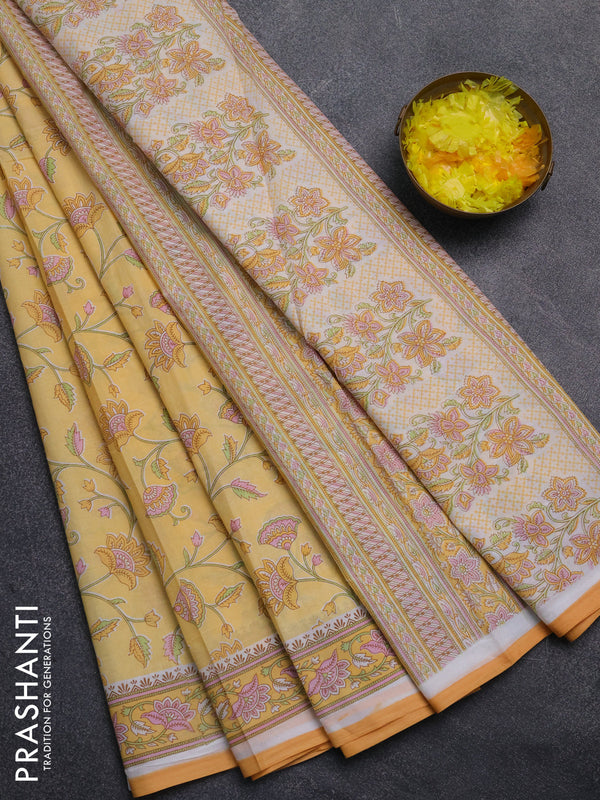 Mul cotton saree yellow with allover floral prints and printed border