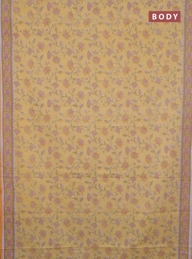 Mul cotton saree yellow with allover floral prints and printed border