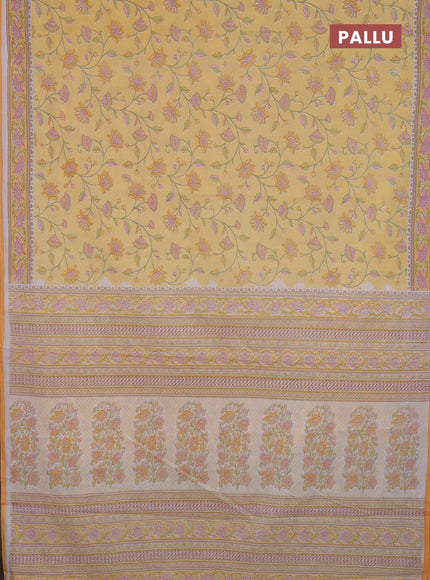 Mul cotton saree yellow with allover floral prints and printed border