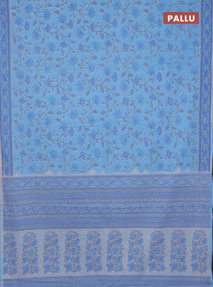 Mul cotton saree light blue with allover floral prints and printed border