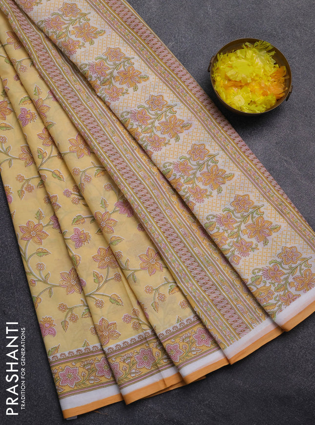 Mul cotton saree yellow orange with allover floral prints and printed border