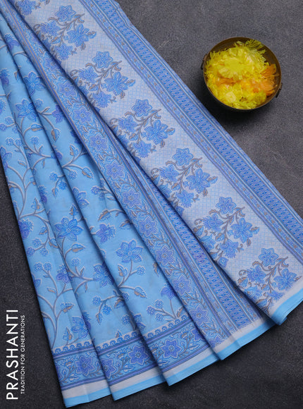 Mul cotton saree light blue with allover floral prints and printed border