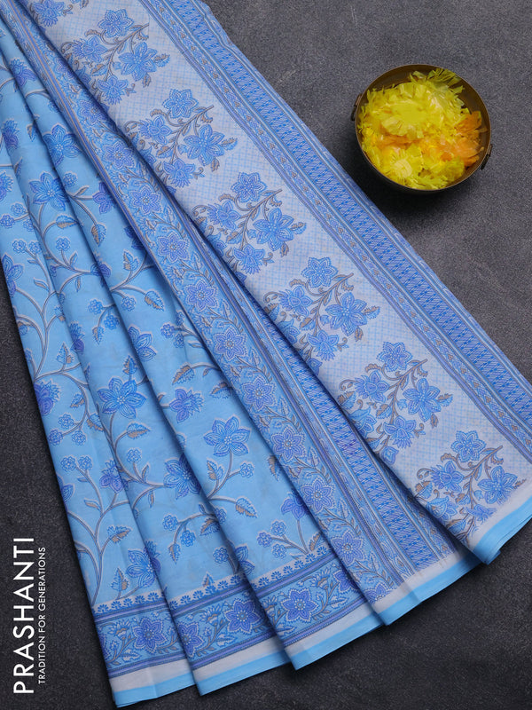 Mul cotton saree light blue with allover floral prints and printed border