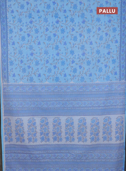 Mul cotton saree light blue with allover floral prints and printed border