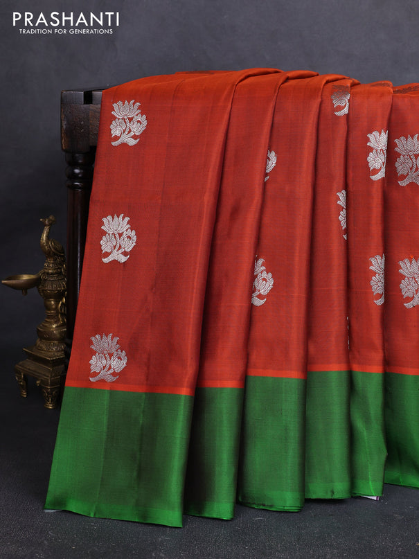 Venkatagiri silk saree orange and green with allover silver zari woven buttas and simple border
