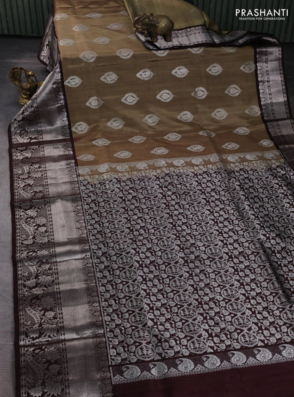 Venkatagiri silk saree elachi green and coffee brown with allover silver zari woven buttas and long silver zari woven border
