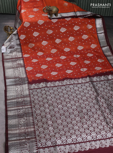 Venkatagiri silk saree orange and deep maroon with allover silver zari woven buttas and silver zari woven border