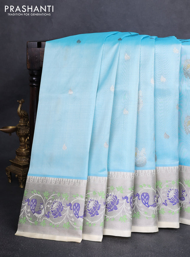 Venkatagiri silk saree teal blue and cream with allover silver zari woven buttas and silver zari woven border