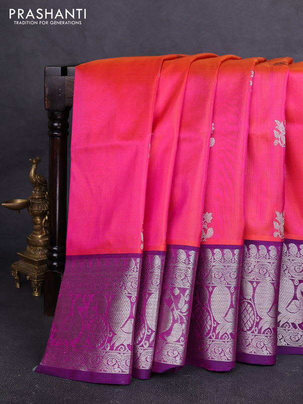 Venkatagiri silk saree dual shade of pinkish orange and royal blue with allover silver zari woven buttas and zari woven border