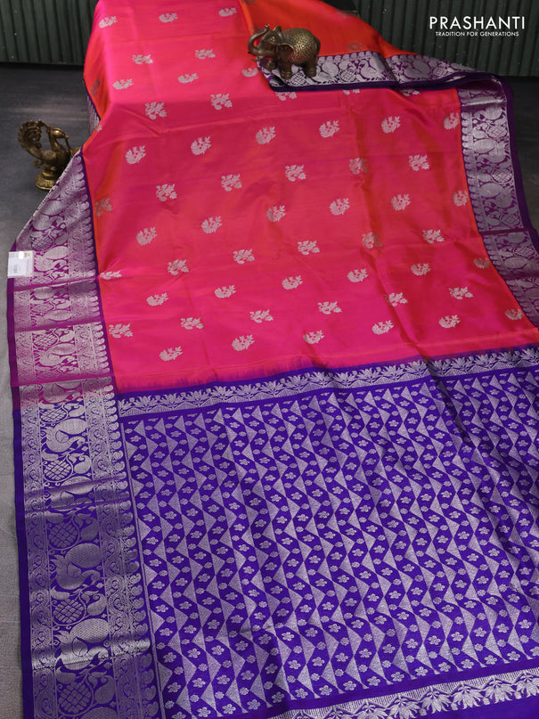 Venkatagiri silk saree dual shade of pinkish orange and royal blue with allover silver zari woven buttas and zari woven border