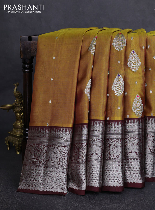 Venkatagiri silk saree mustard green and coffee brown with allover silver zari woven buttas and long silver zari woven border