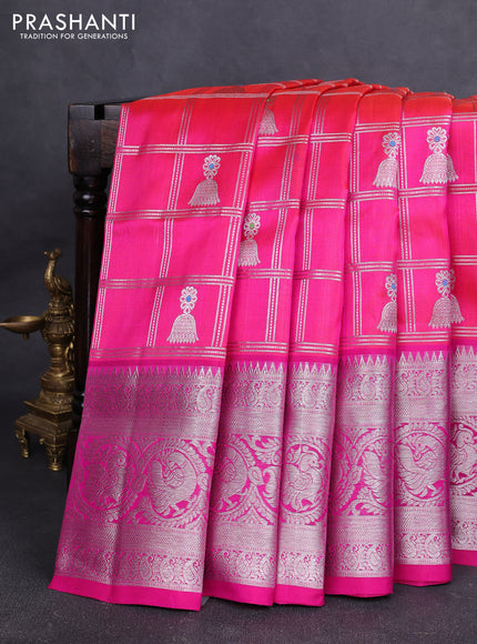 Venkatagiri silk saree dual shade of pinkish orange and pink with allover silver zari checks & buttas and long silver zari woven border
