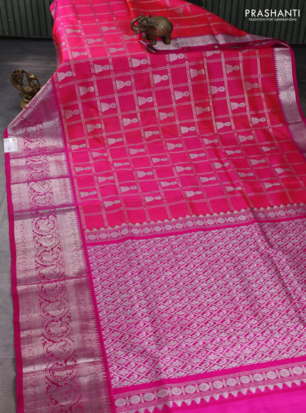Venkatagiri silk saree dual shade of pinkish orange and pink with allover silver zari checks & buttas and long silver zari woven border