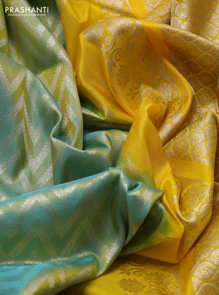Venkatagiri silk saree dual shade of teal blue and yellow with allover zigzag silver & zari weaves and silver zari woven border