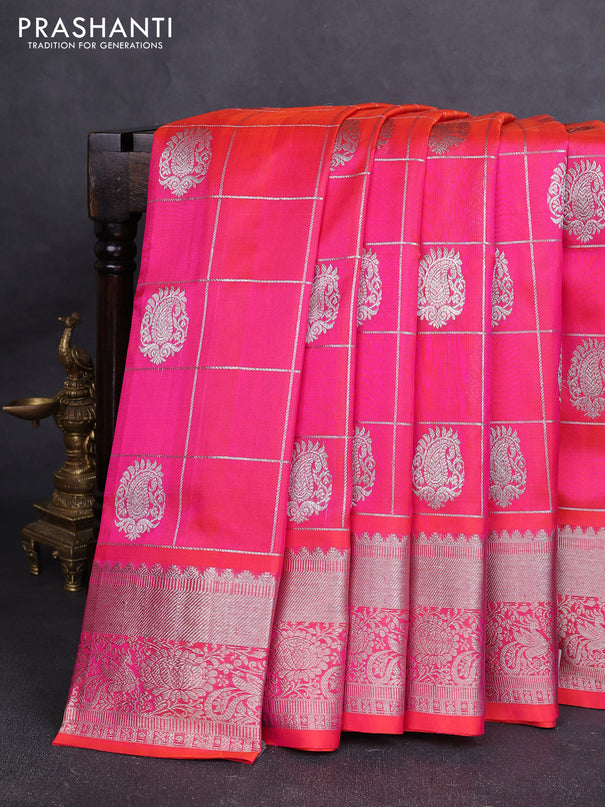 Venkatagiri silk saree dual shade of pinkish orange with allover silver zari checks & buttas and silver zari woven border