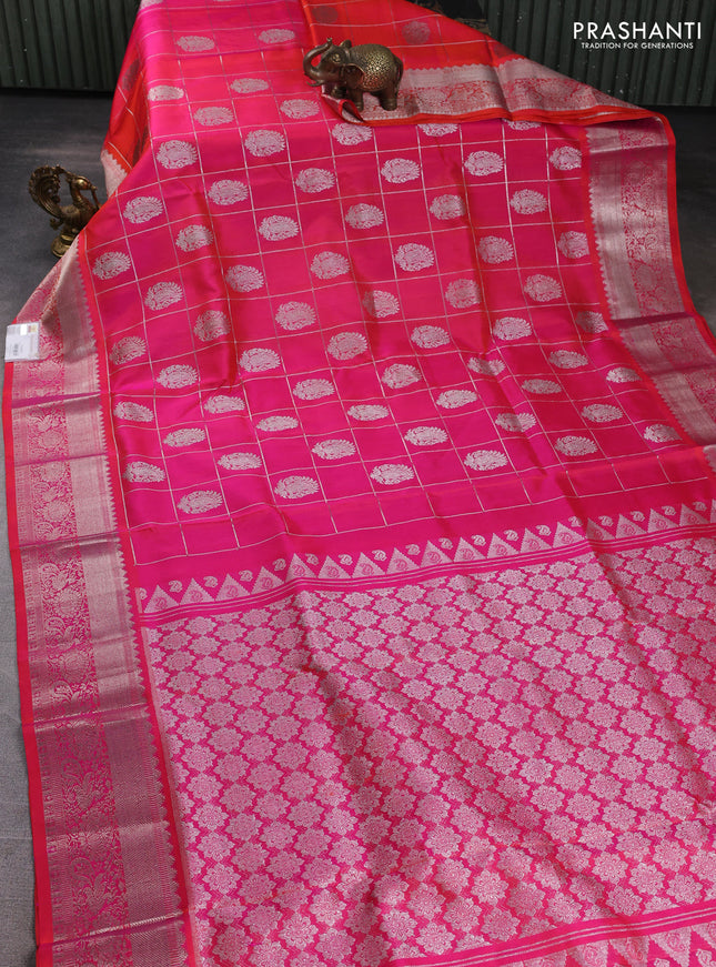 Venkatagiri silk saree dual shade of pinkish orange with allover silver zari checks & buttas and silver zari woven border