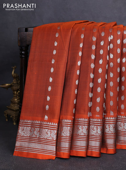 Venkatagiri silk saree orange with allover silver zari nwoven buttas and silver zari woven border