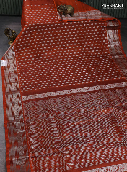 Venkatagiri silk saree orange with allover silver zari nwoven buttas and silver zari woven border